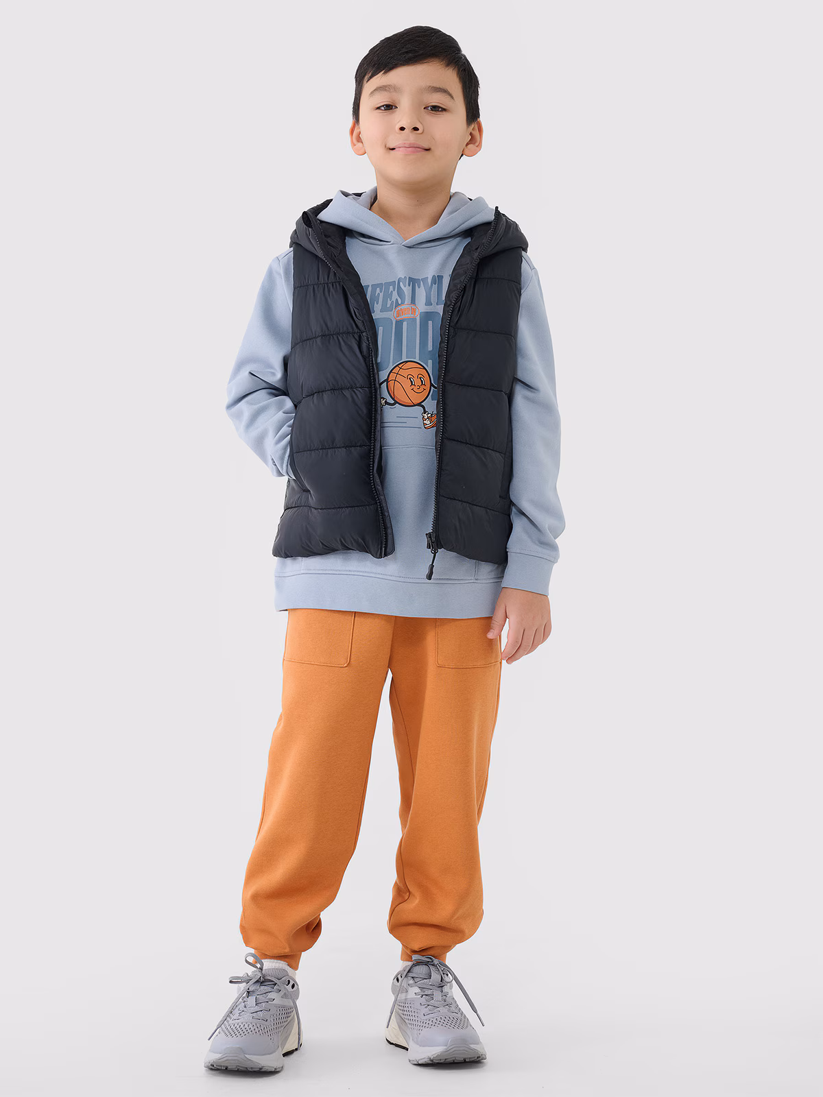 Bezrękawnik puchowy z wypełnieniem syntetycznym chłopięcy - pomarańczowy