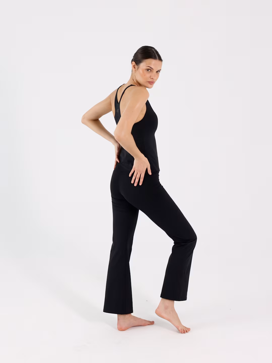 Legginsy do jogi i pilatesu z rozszerzanymi nogawkami damskie - czarne