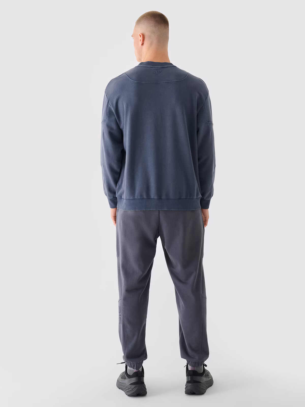 Spodnie dresowe joggery męskie 4F x Robert Lewandowski - szare