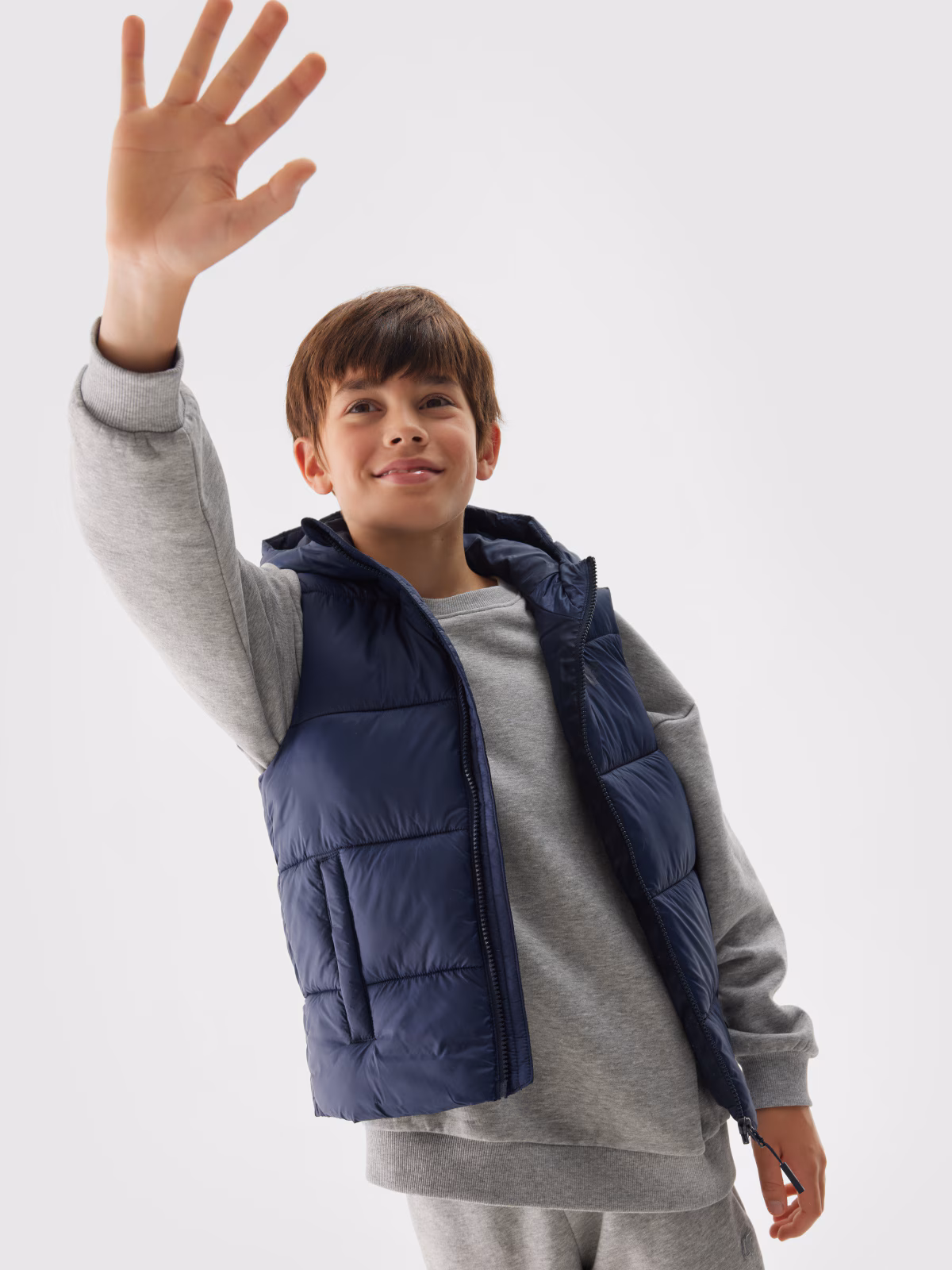 Bezrękawnik puchowy pikowany z kapturem chłopięcy - granatowy