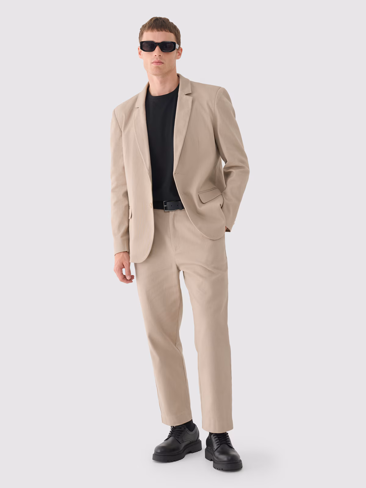 Spodnie tkaninowe męskie Outhorn - beżowe