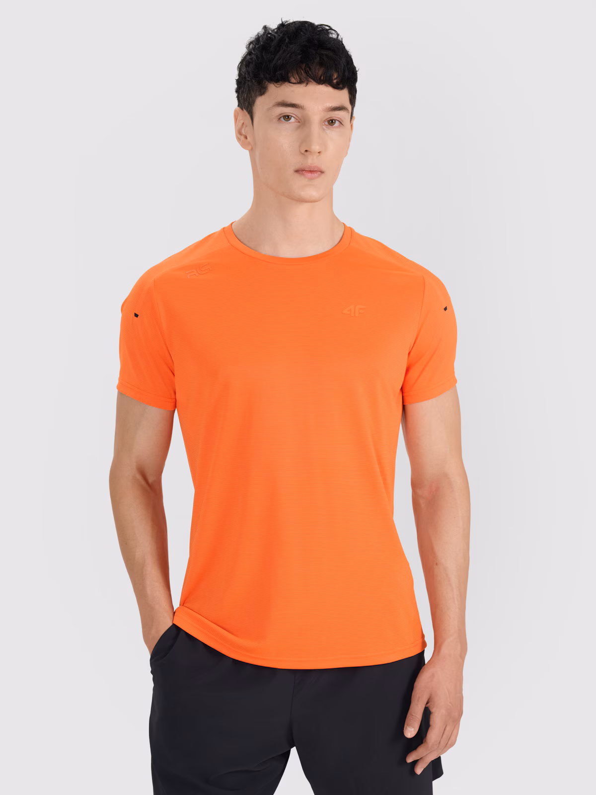 Koszulka treningowa regular szybkoschnąca męska 4F x Robert Lewandowski - pomarańczowa