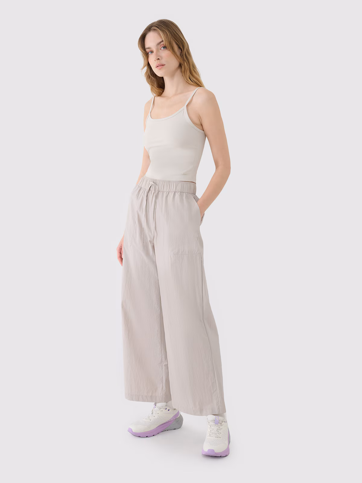 Spodnie casual z szerokimi nogawkami damskie - beżowe