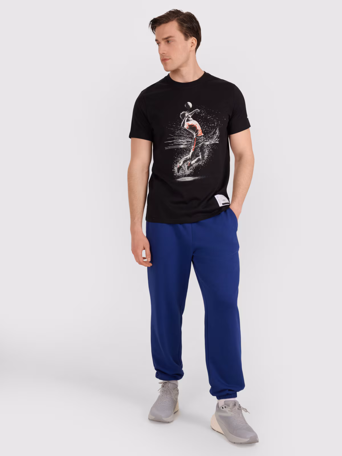 T-shirt regular z nadrukiem siatkarskim męski - biały