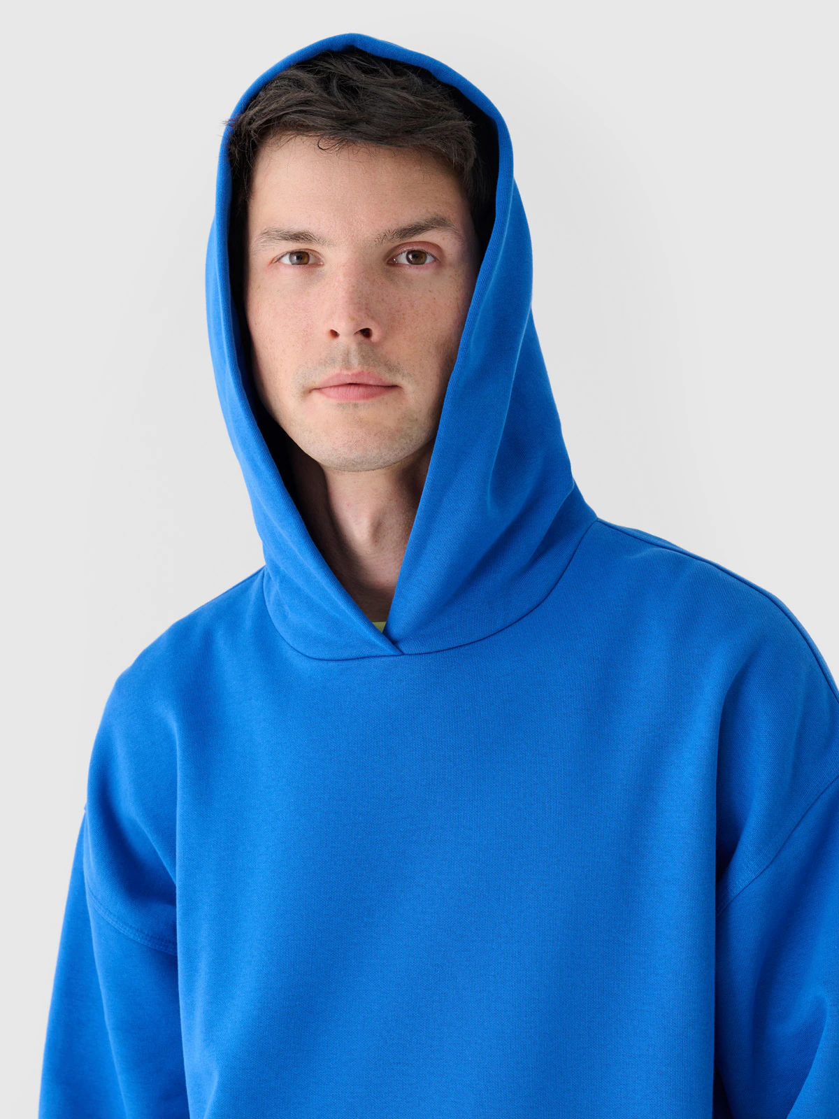 Bluza dresowa nierozpinana z kapturem męska - niebieska