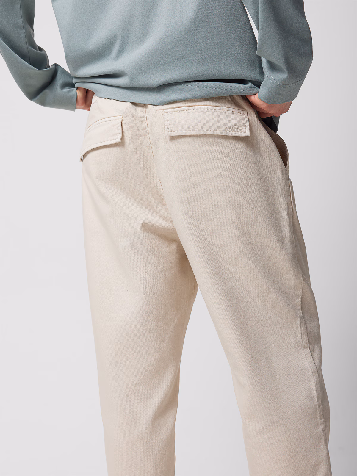 Spodnie tkaninowe męskie Outhorn - beżowe