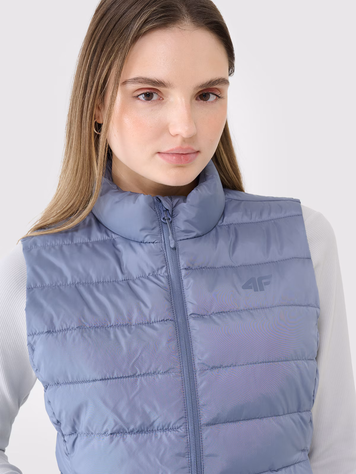 Bezrękawnik puchowy z wypełnieniem syntetycznym damski - granatowy