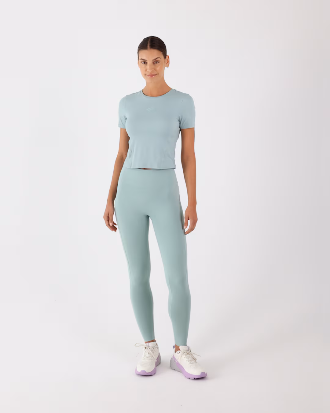 Koszulka do jogi i pilatesu slim szybkoschnąca damska - turkusowa