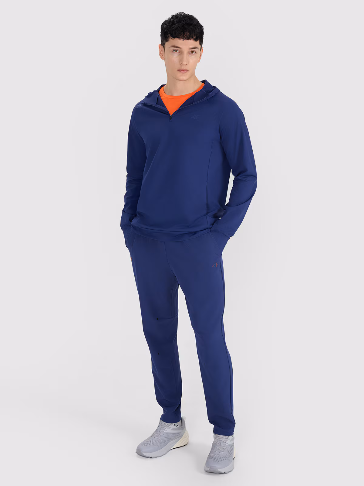 Spodnie treningowe szybkoschnące męskie 4F x Robert Lewandowski - granatowe