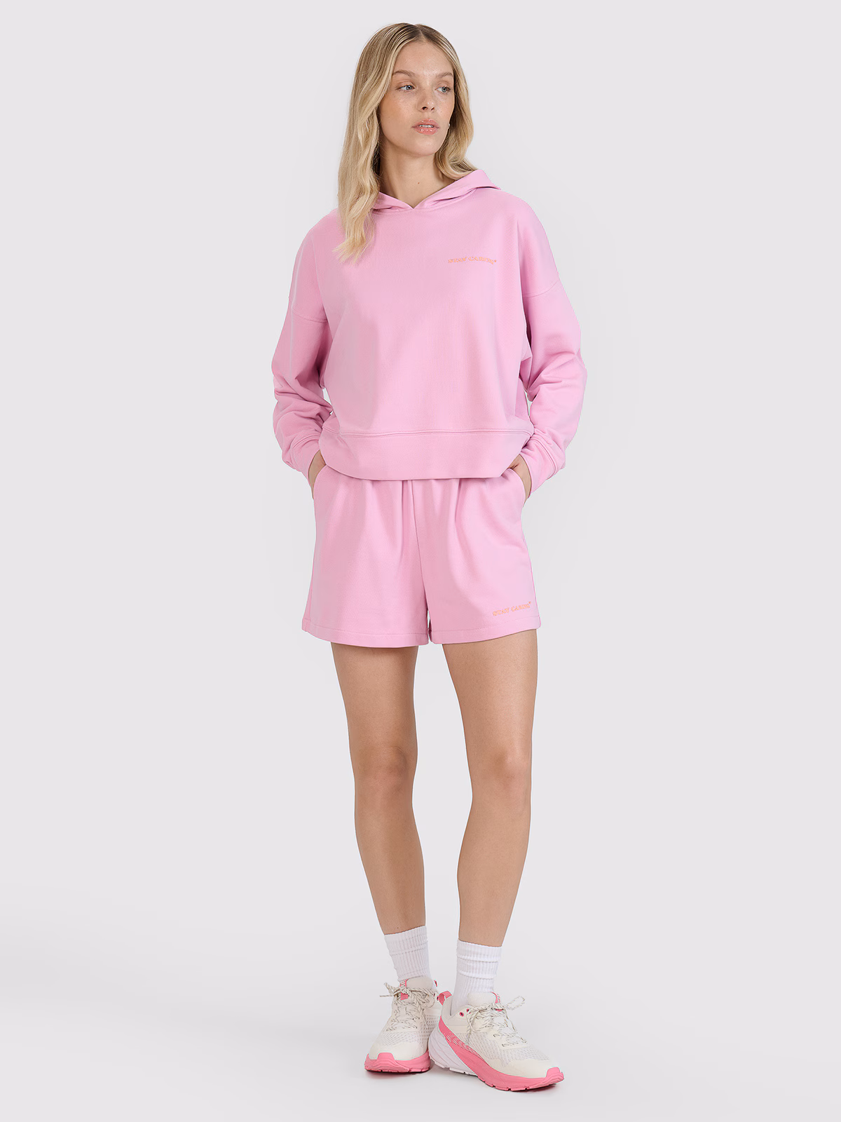 Bluza dresowa nierozpinana z kapturem damska - pomarańczowa