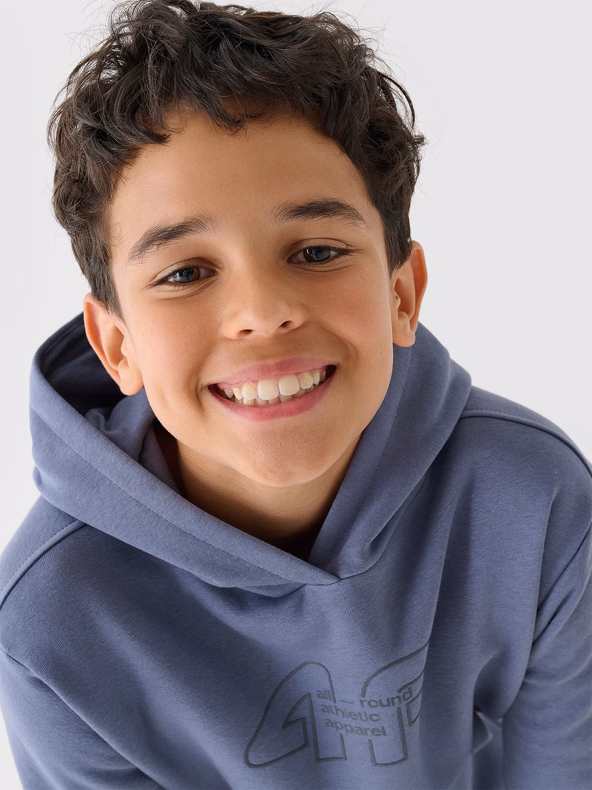 Bluza dresowa nierozpinana z kapturem chłopięca - niebieska