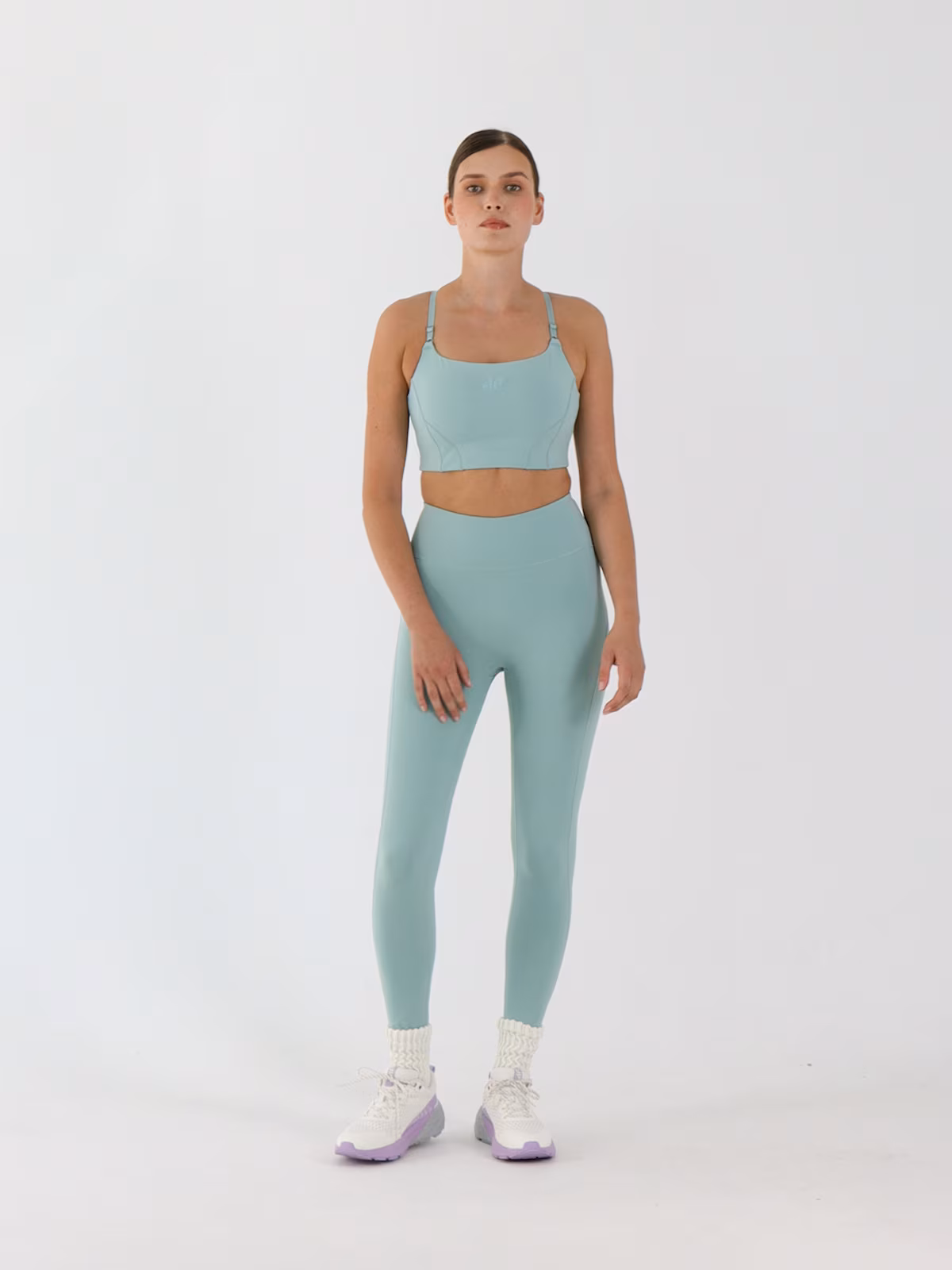 Biustonosz do jogi i pilatesu z niskim wsparciem - turkusowy