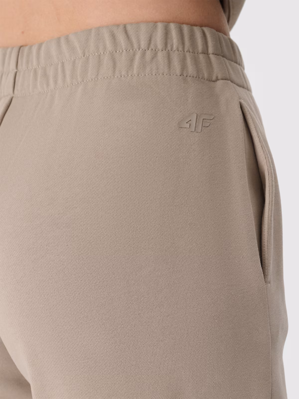 Spodnie dresowe z szerokimi nogawkami damskie - beżowe