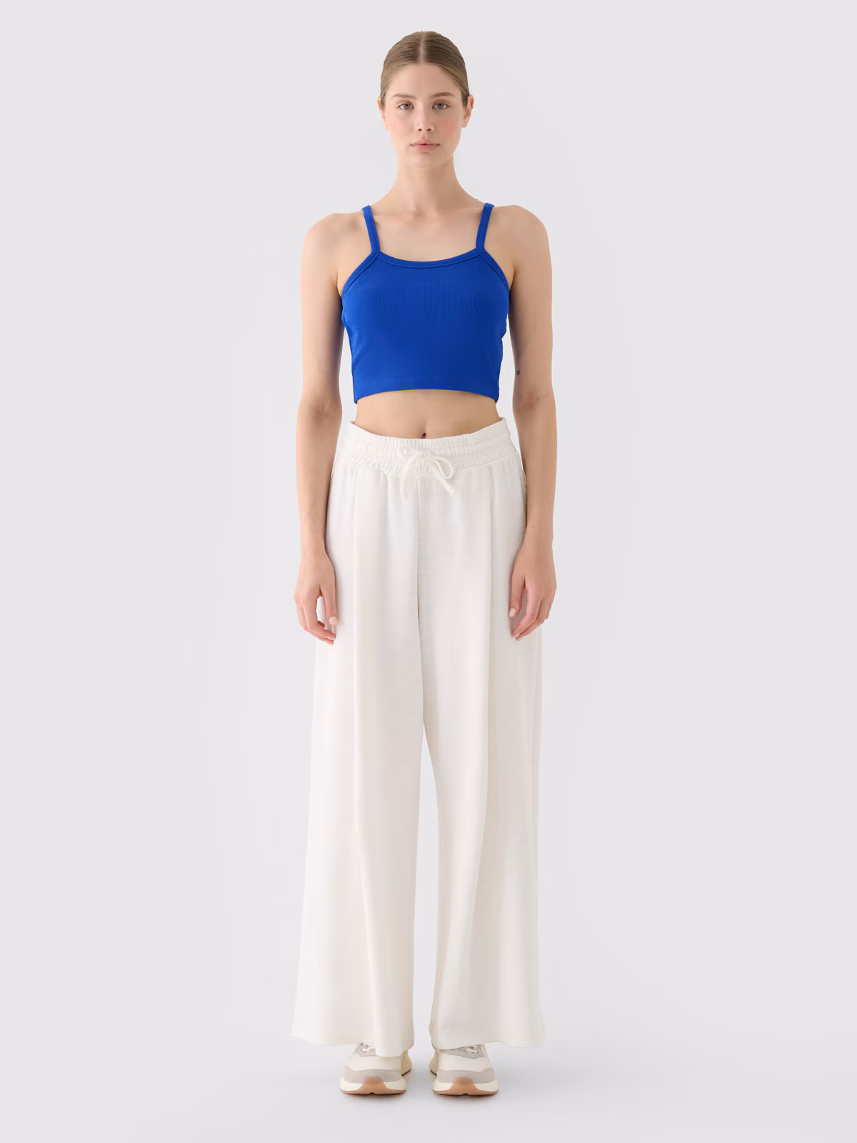 Spodnie dresowe z szerokimi nogawkami damskie - białe