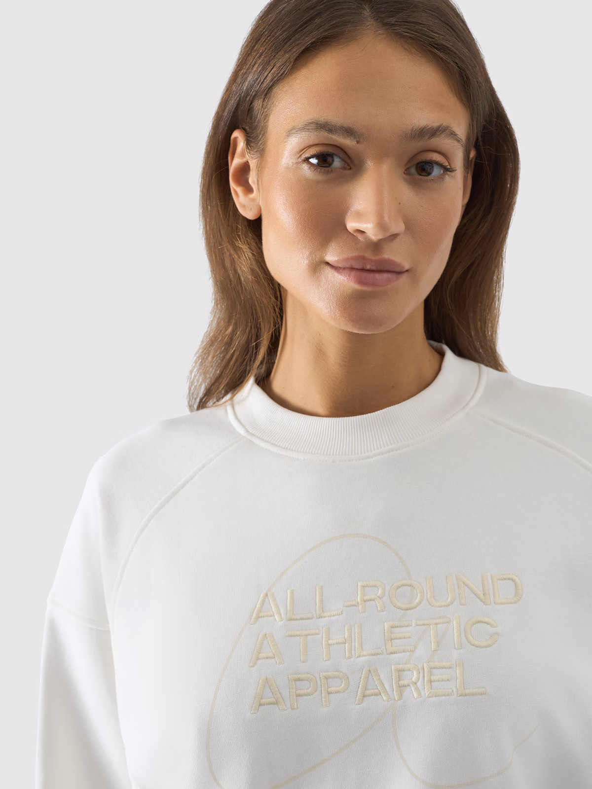 Bluza dresowa nierozpinana bez kaptura damska - biała