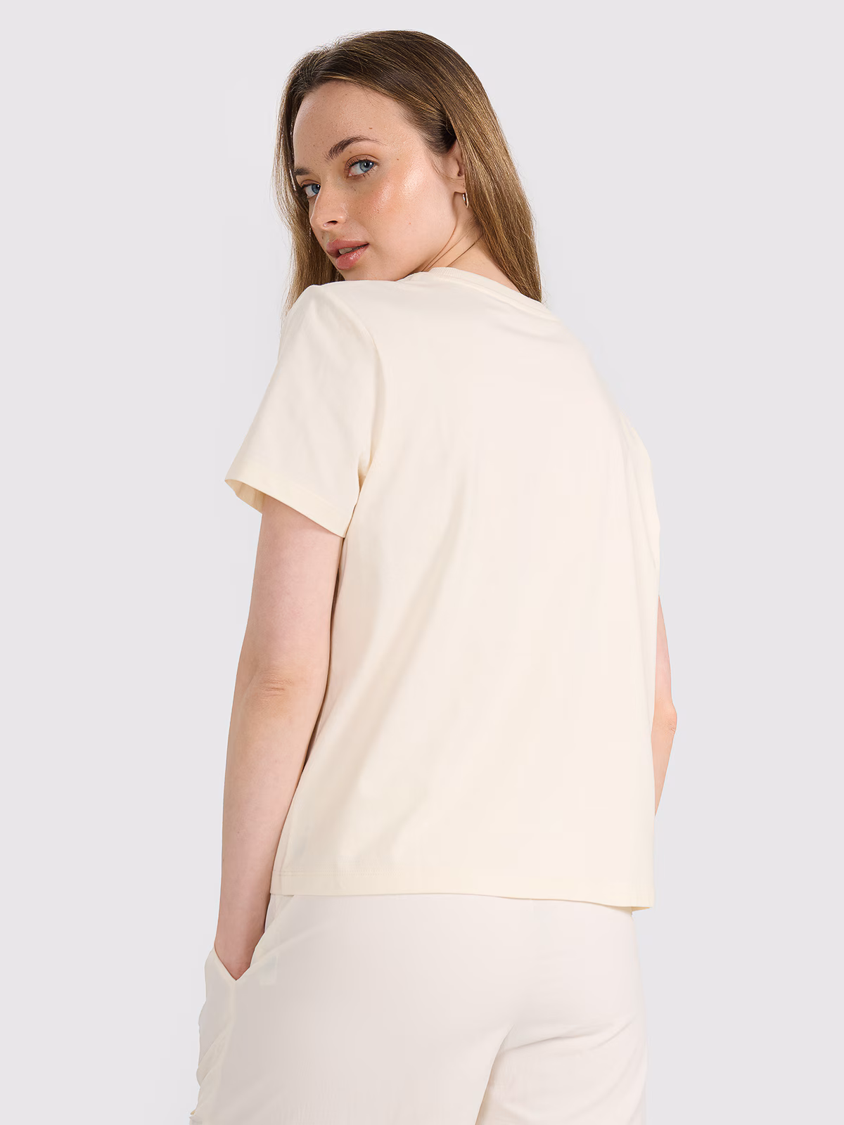 T-shirt oversize z nadrukiem damski - beżowy