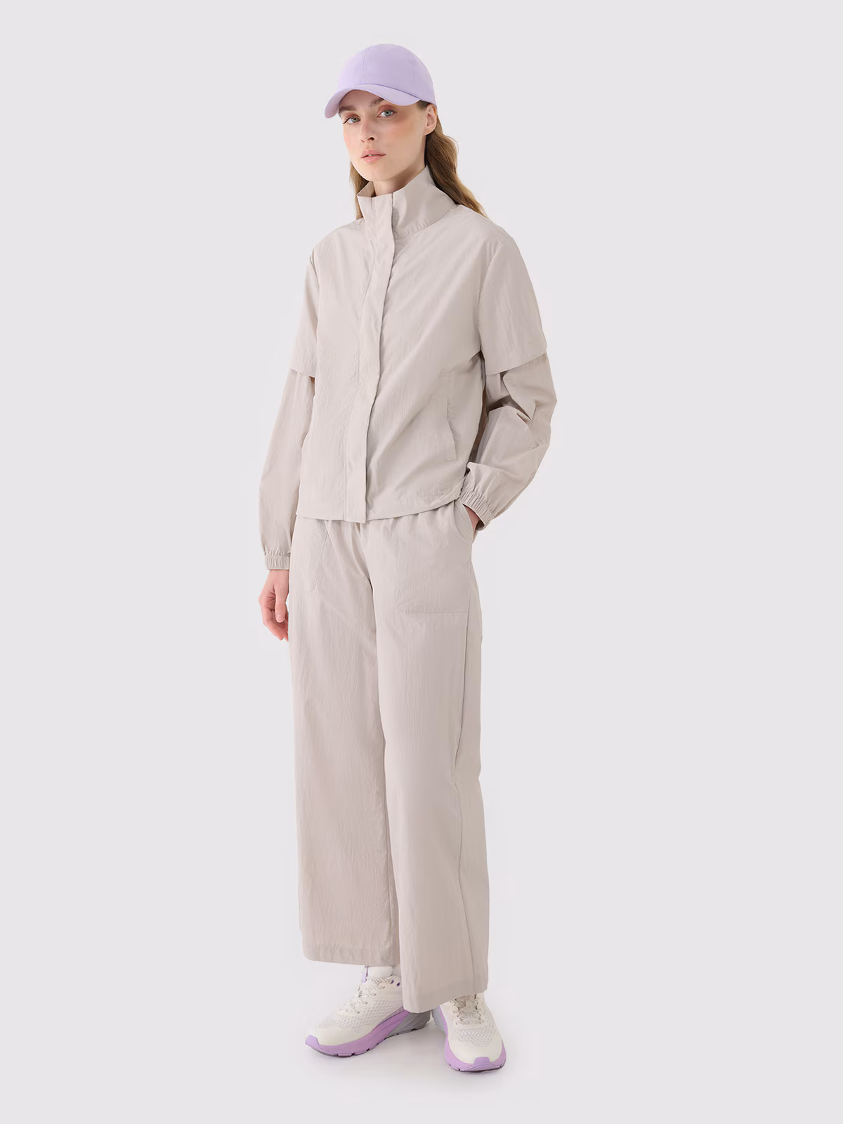 Spodnie casual z szerokimi nogawkami damskie - beżowe