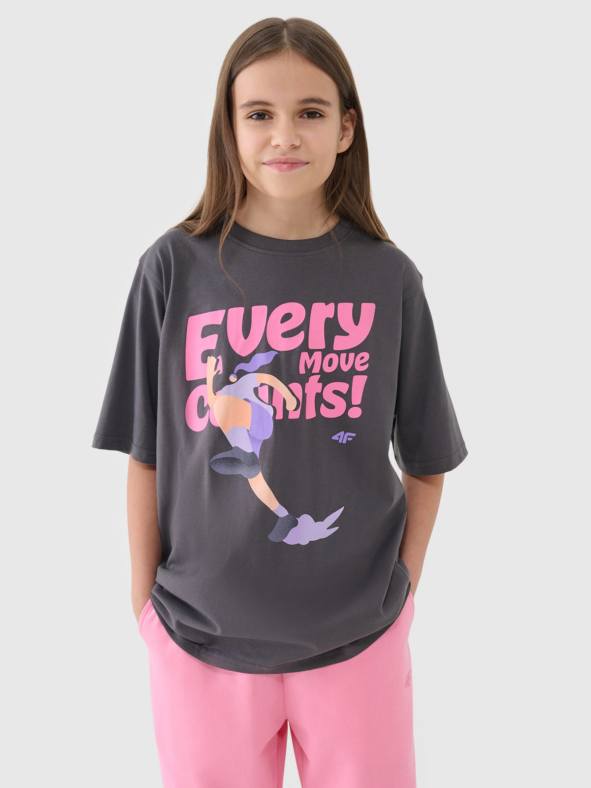 T-shirt oversize z nadrukiem dziewczęcy - różowy