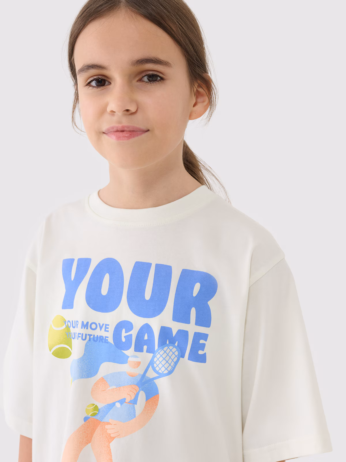 T-shirt oversize z nadrukiem dziewczęcy - różowy