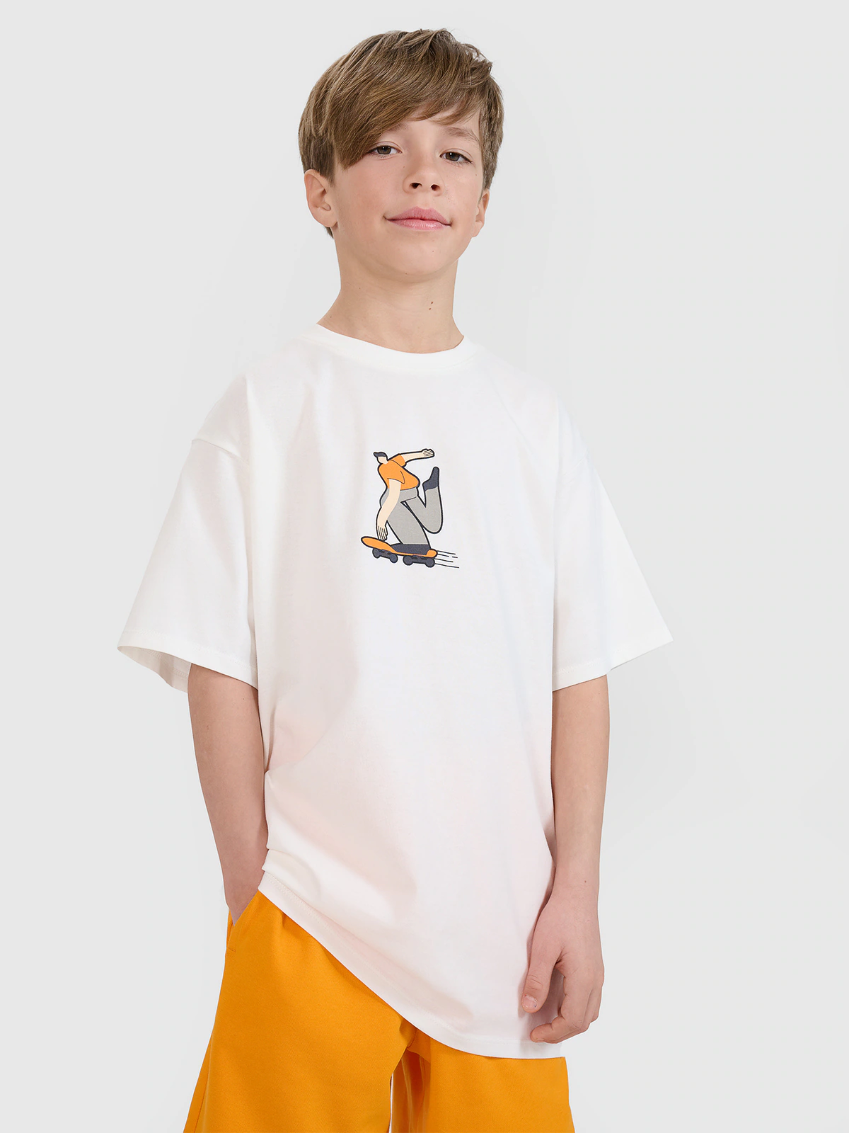 T-shirt oversize z nadrukiem chłopięcy - żółty