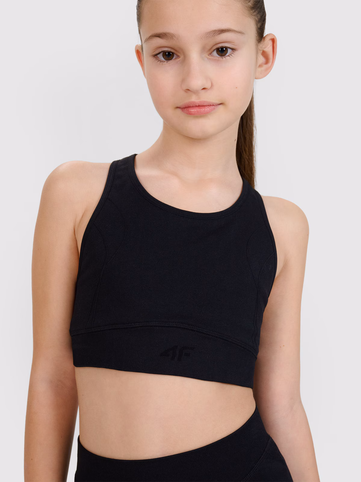 Crop top sportowy szybkoschnący dziewczęcy 4F JUNIOR x Anna Lewandowska - fioletowy