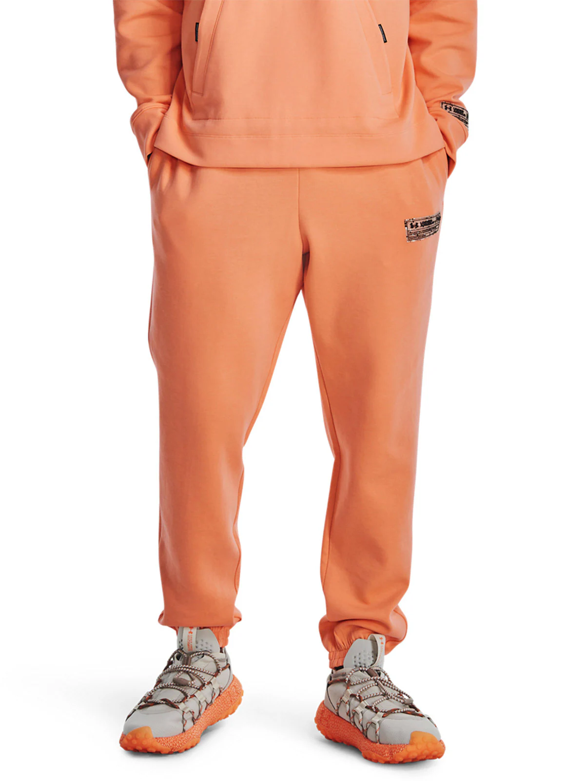 Spodnie dresowe uniseks Under Armour UA Summit Knit Joggers - pomarańczowe