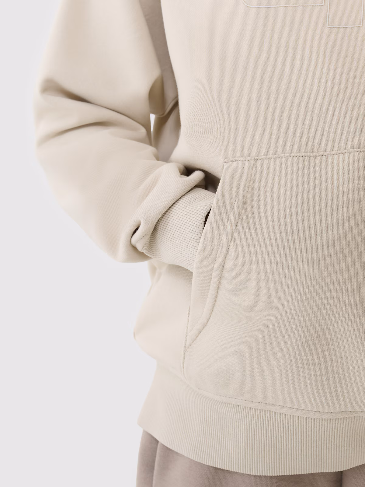 Bluza dresowa nierozpinana z kapturem chłopięca - pomarańczowa