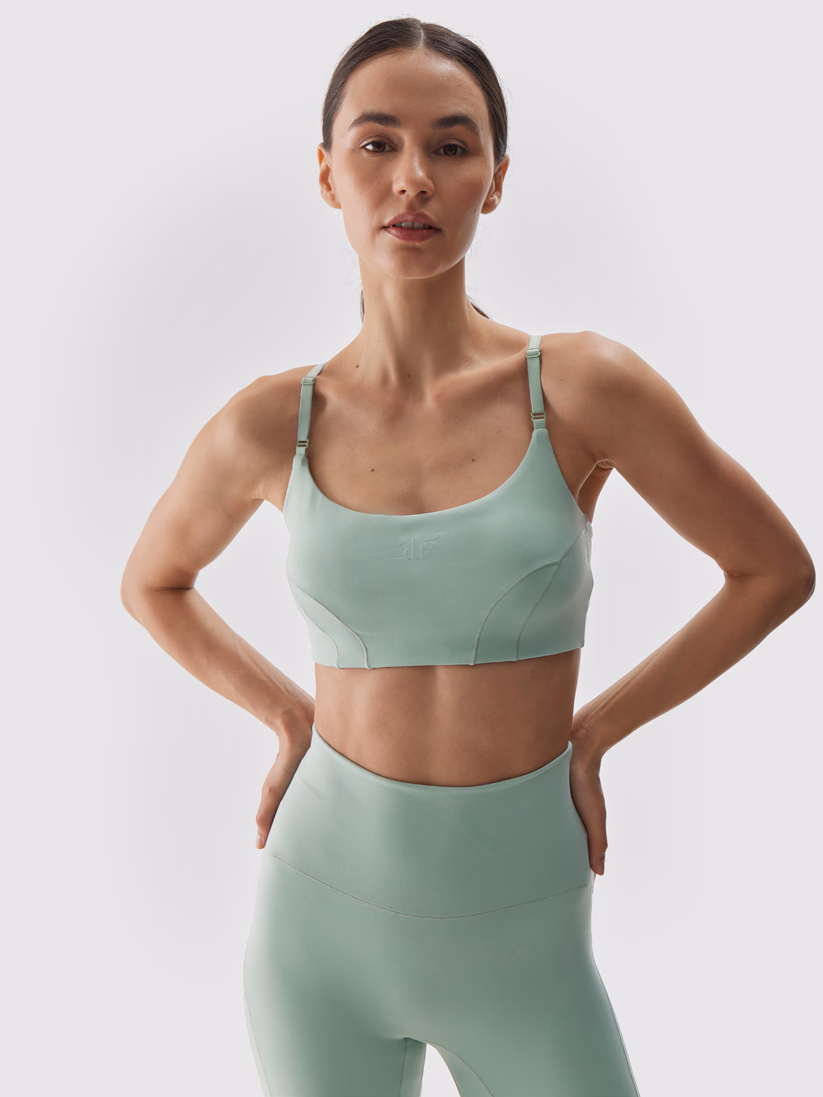 Biustonosz do jogi i pilatesu z niskim wsparciem - turkusowy