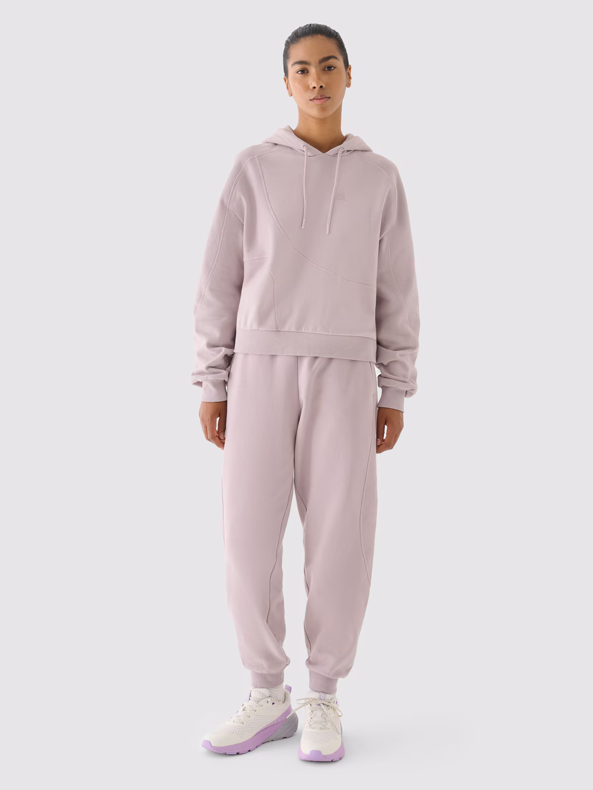 Spodnie dresowe oversize damskie 4F x Anna Lewandowska - czarne