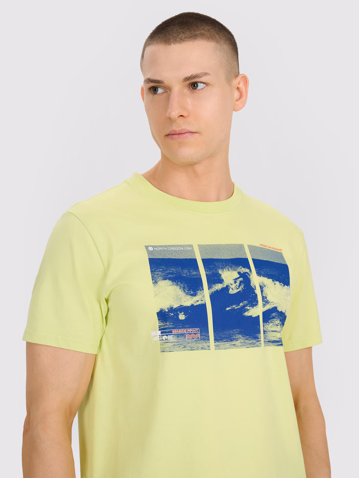 T-shirt regular z nadrukiem męski - turkusowy