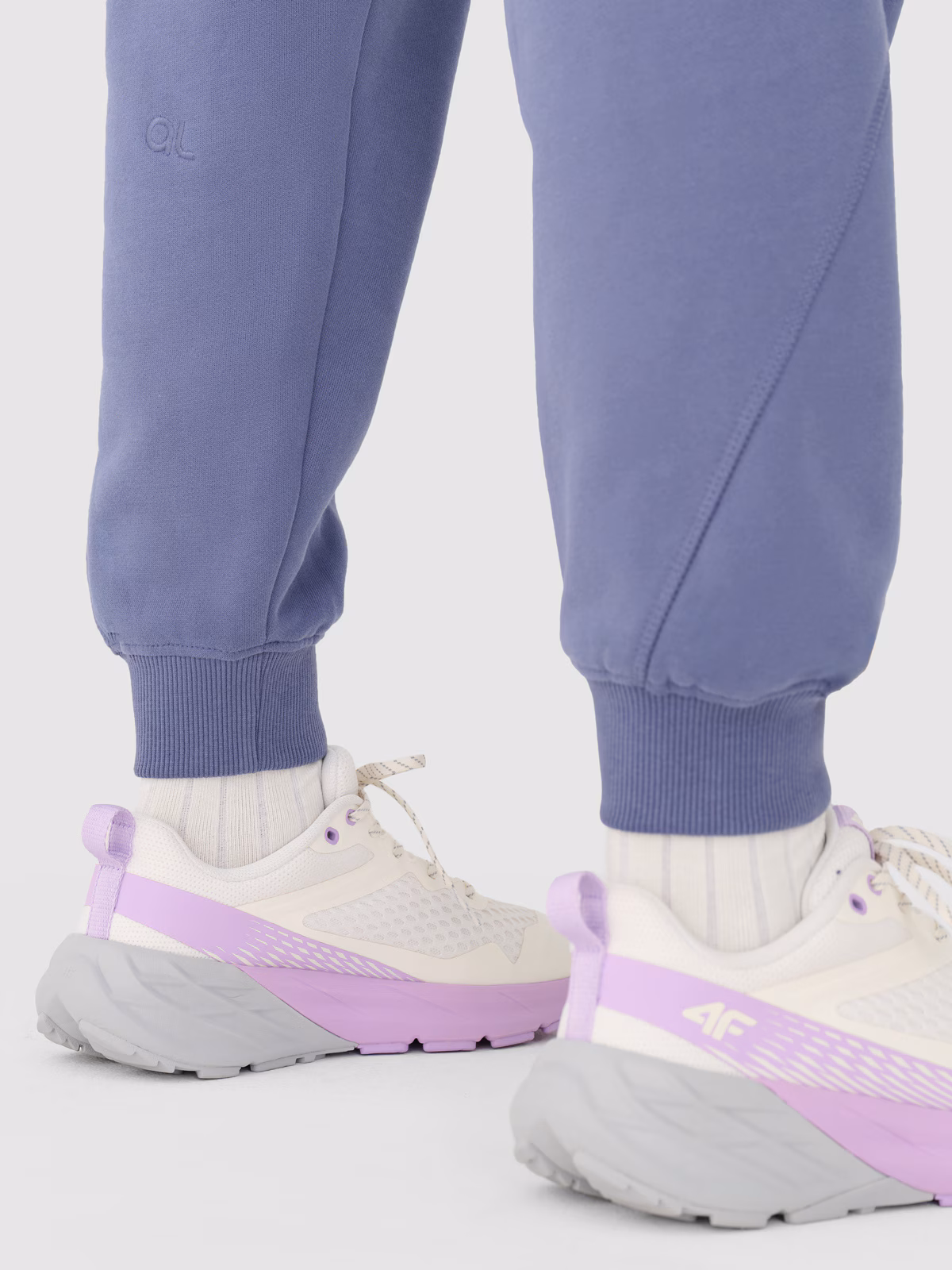 Spodnie dresowe oversize damskie 4F x Anna Lewandowska - czarne