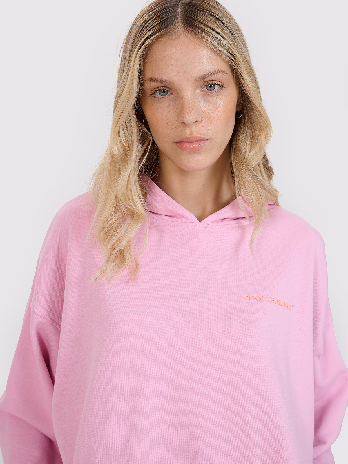 Bluza dresowa nierozpinana z kapturem damska - pomarańczowa