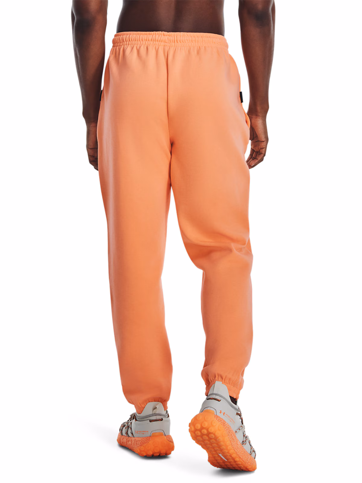 Spodnie dresowe uniseks Under Armour UA Summit Knit Joggers - pomarańczowe