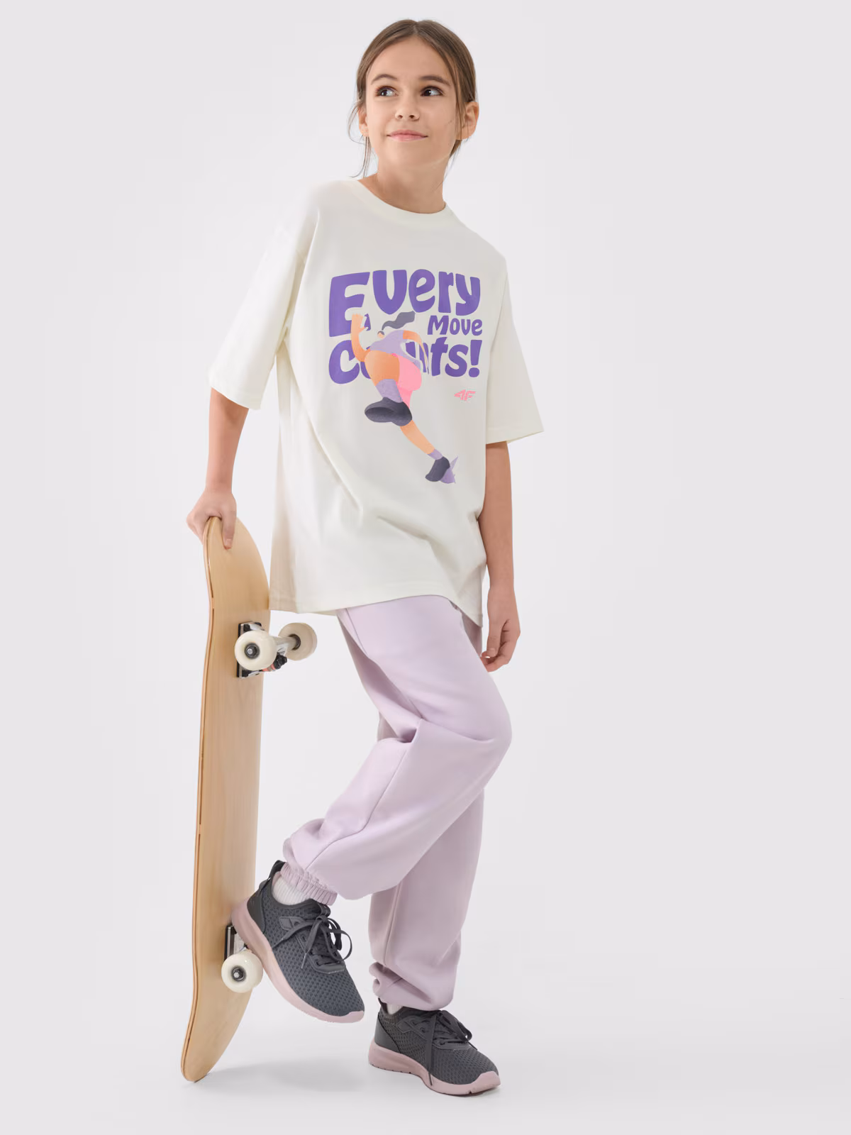 T-shirt oversize z nadrukiem dziewczęcy - różowy