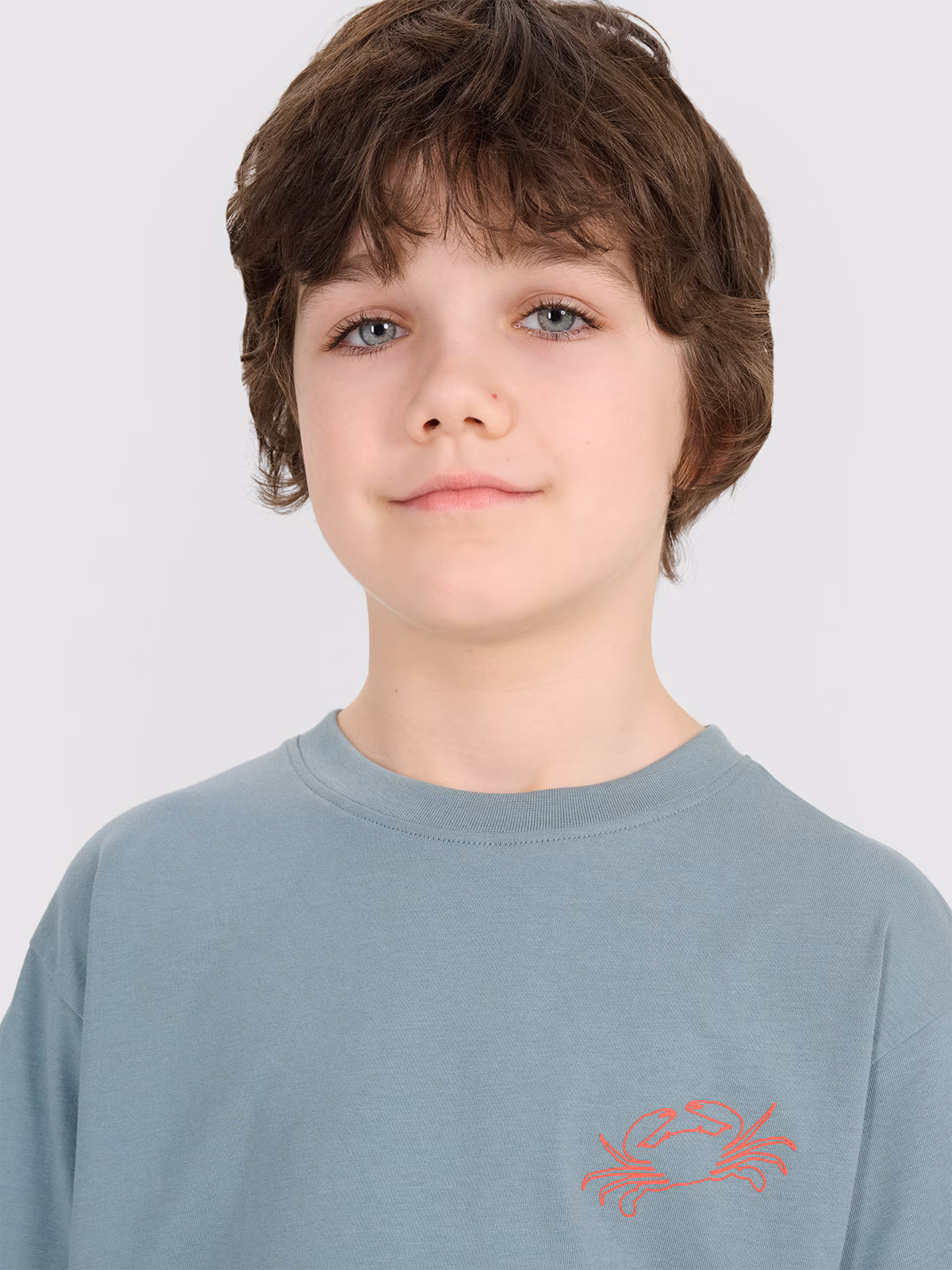 T-shirt oversize z nadrukiem chłopięcy - turkusowy