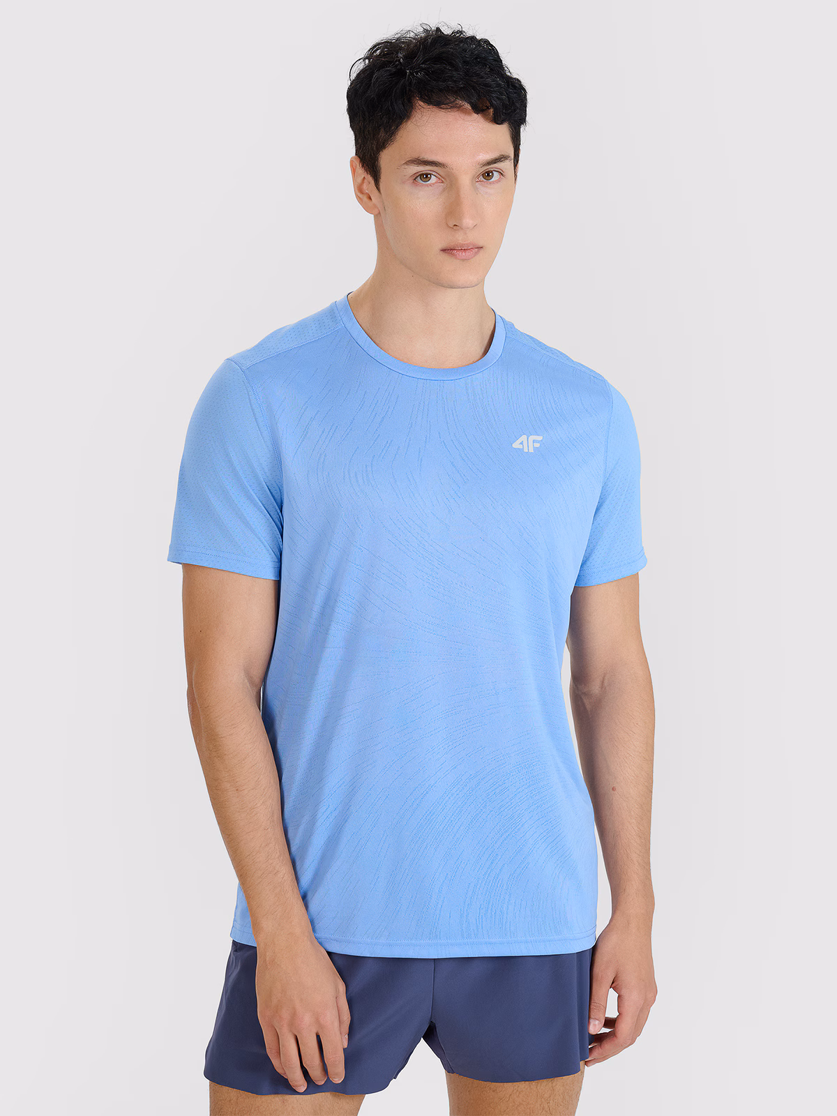 Koszulka do biegania regular szybkoschnąca męska - niebieska