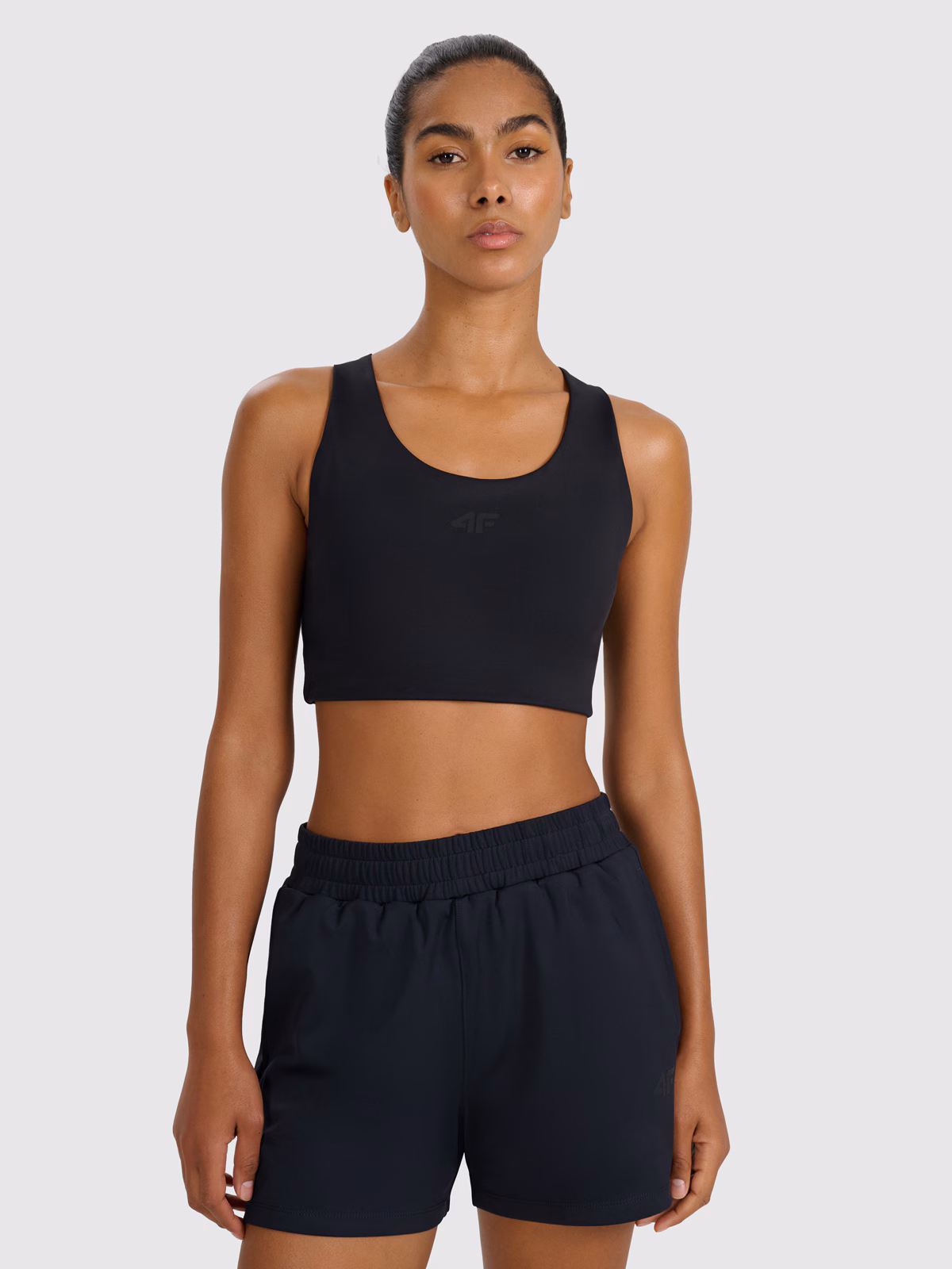 Biustonosz treningowy z niskim wsparciem damski - czarny