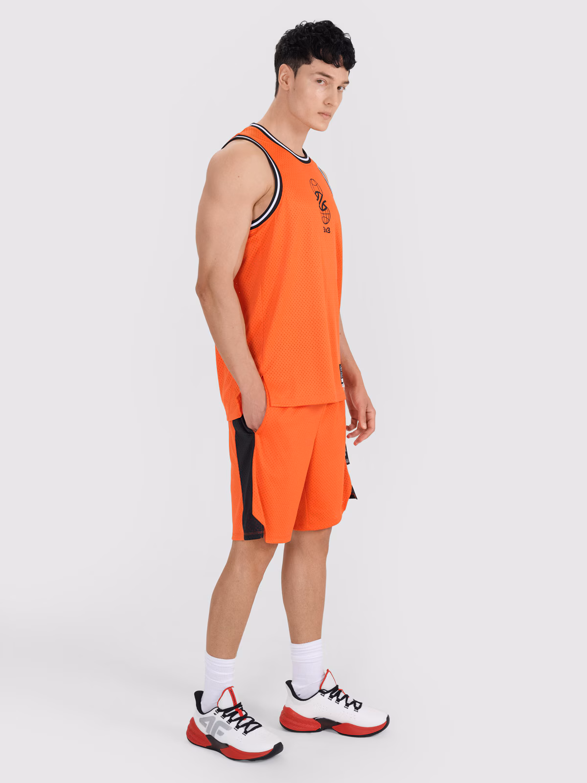 Spodenki do koszykówki szybkoschnące męskie - pomarańczowe