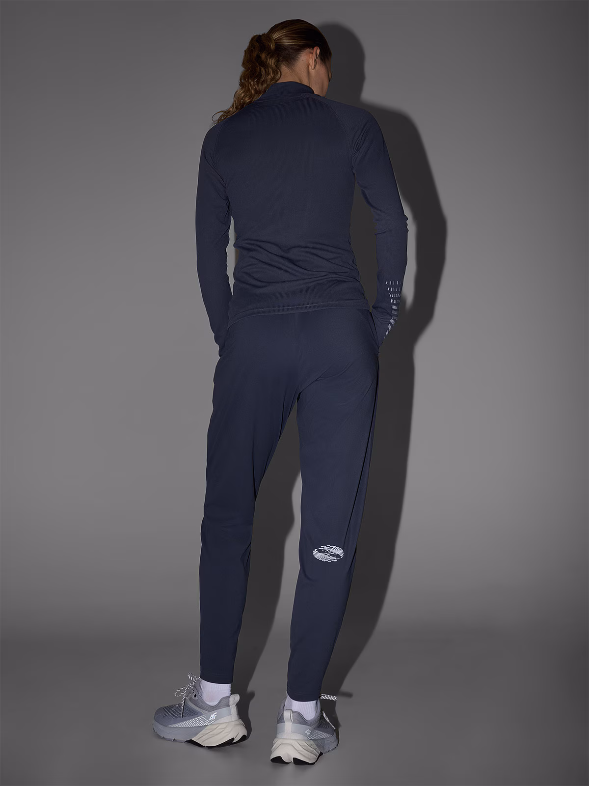 Spodnie do biegania w terenie szybkoschnące damskie - szare