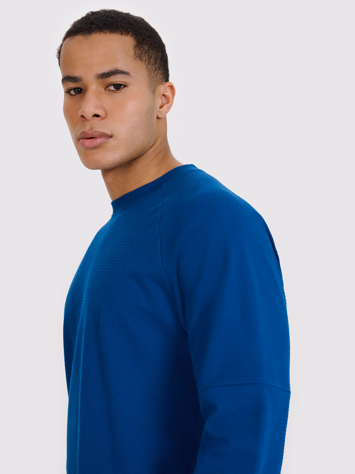 Bluza dresowa nierozpinana bez kaptura męska - niebieska