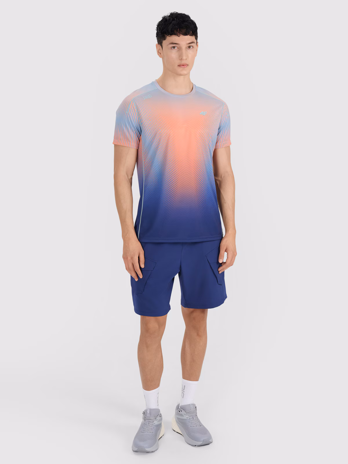 T-shirt treningowy regular szybkoschnący męski 4F x Robert Lewandowski - turkusowy