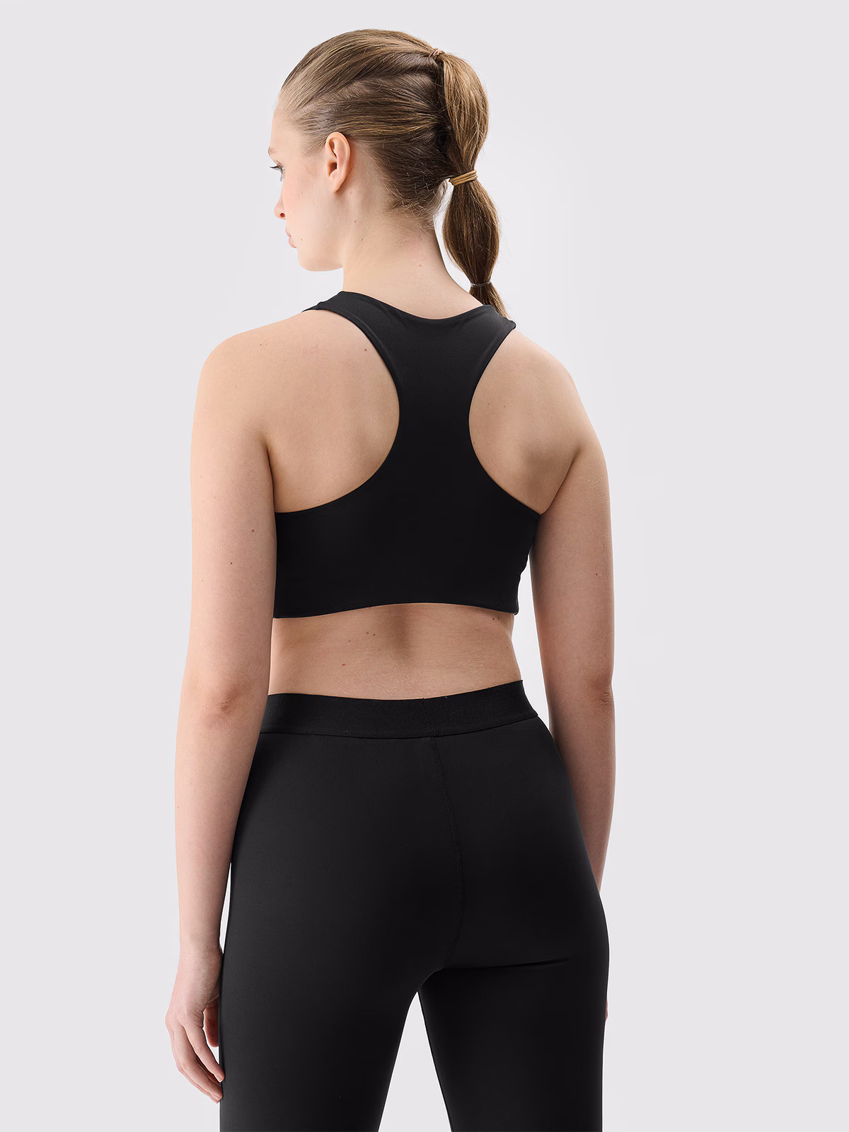 Biustonosz treningowy z niskim wsparciem damski - czarny