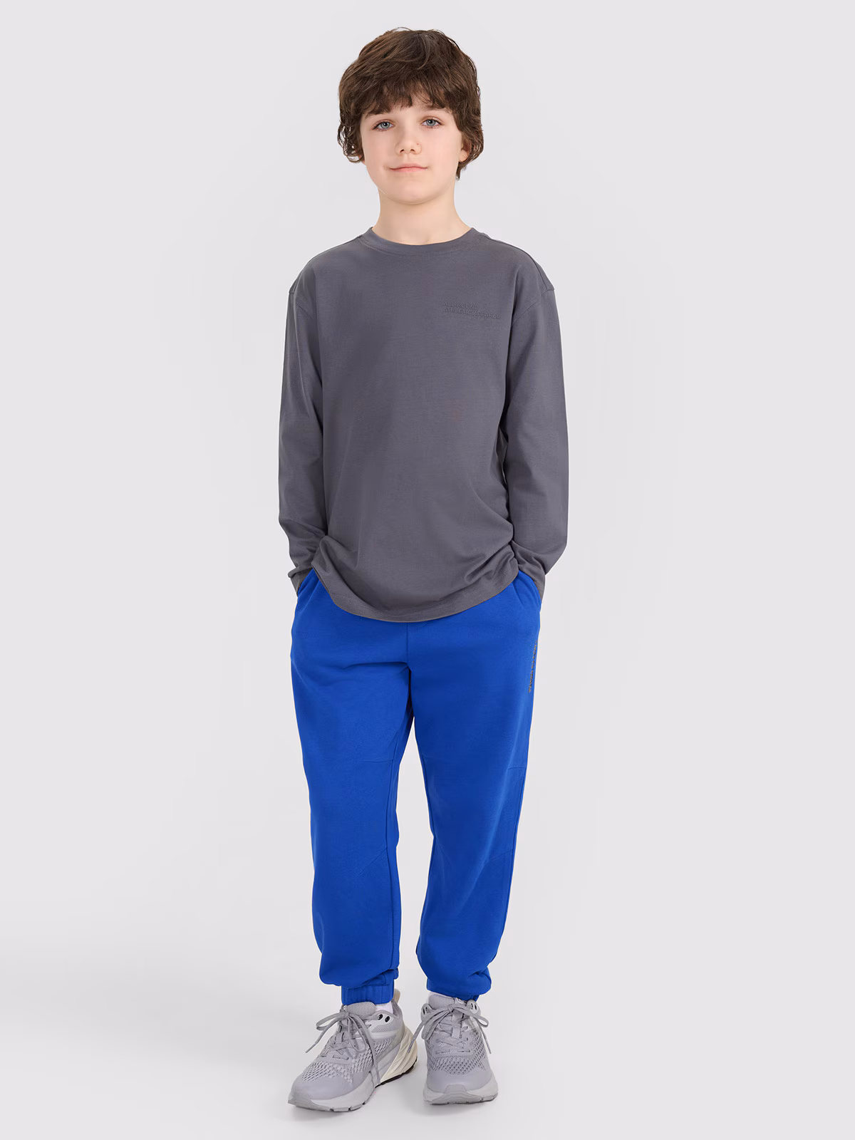 Longsleeve oversize z nadrukiem chłopięcy - beżowy