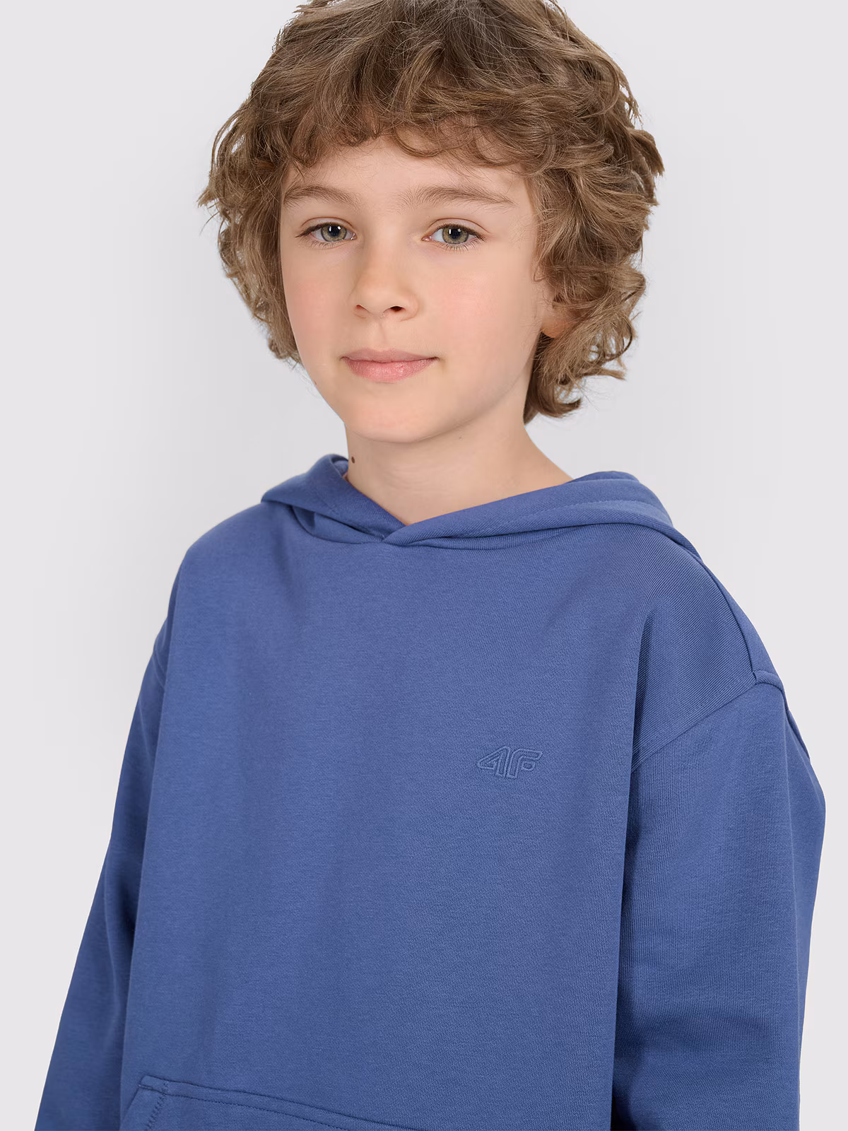 Bluza dresowa nierozpinana z kapturem chłopięca - niebieska