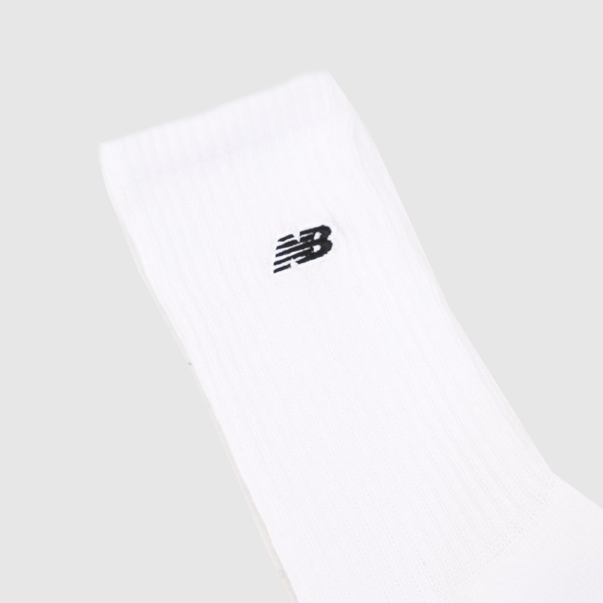 New Balance  Patch Logo Crew Socks 3 Pack in White New Balance  Patch Logo Crew Socks 3 Pack in White