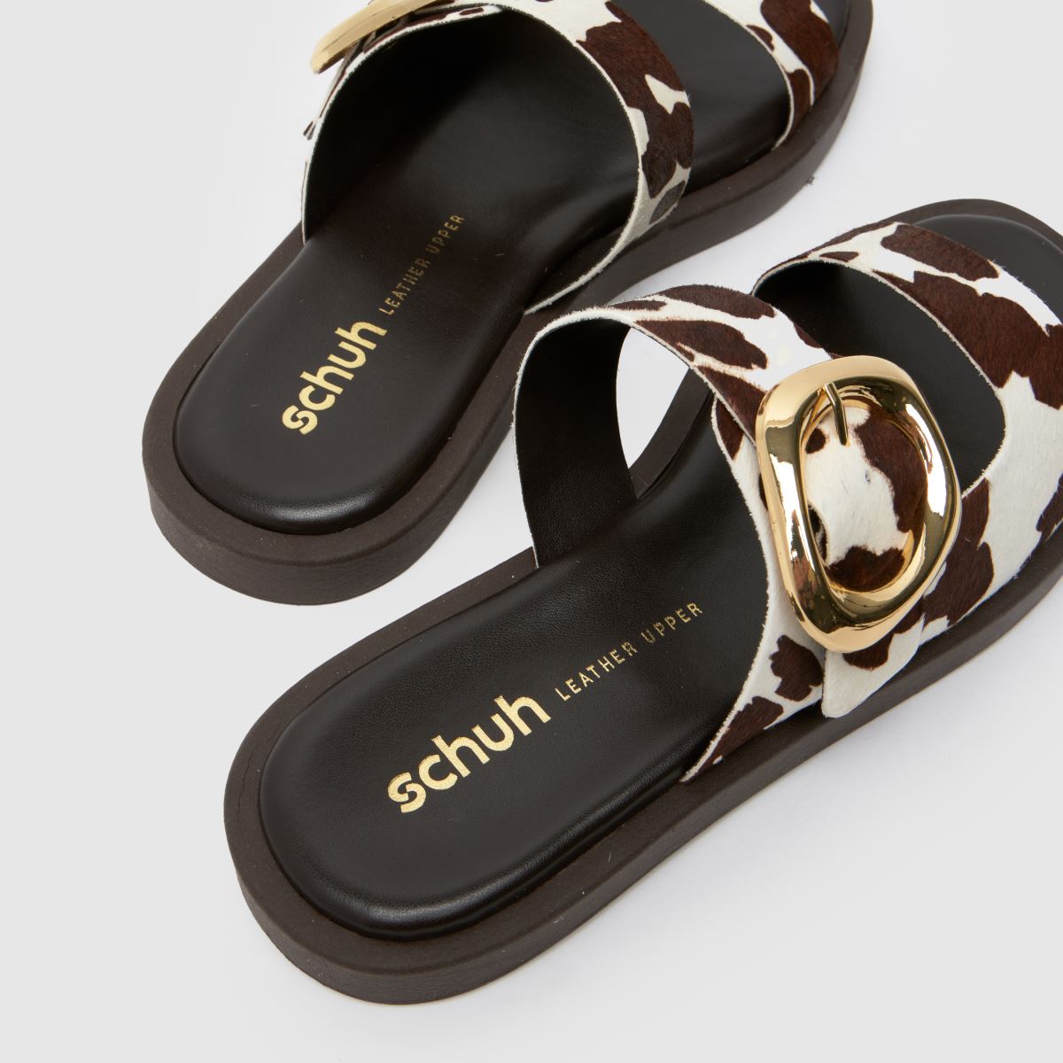 schuh  Teela Buckle Footwear in Brown & White schuh  Teela Buckle Footwear in Brown & White