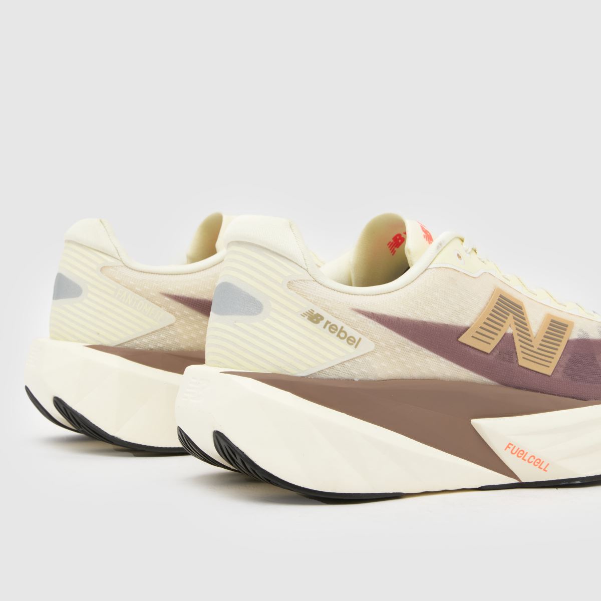 New Balance  FuelCell Rebel V5 in Beige & Brown New Balance  FuelCell Rebel V5 in Beige & Brown