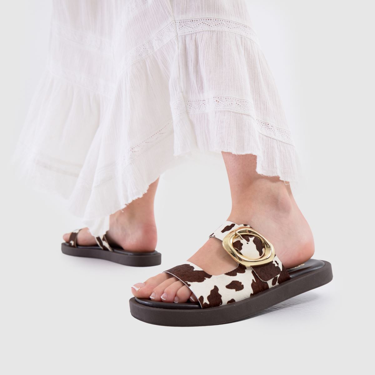 schuh  Teela Buckle Footwear in Brown & White schuh  Teela Buckle Footwear in Brown & White