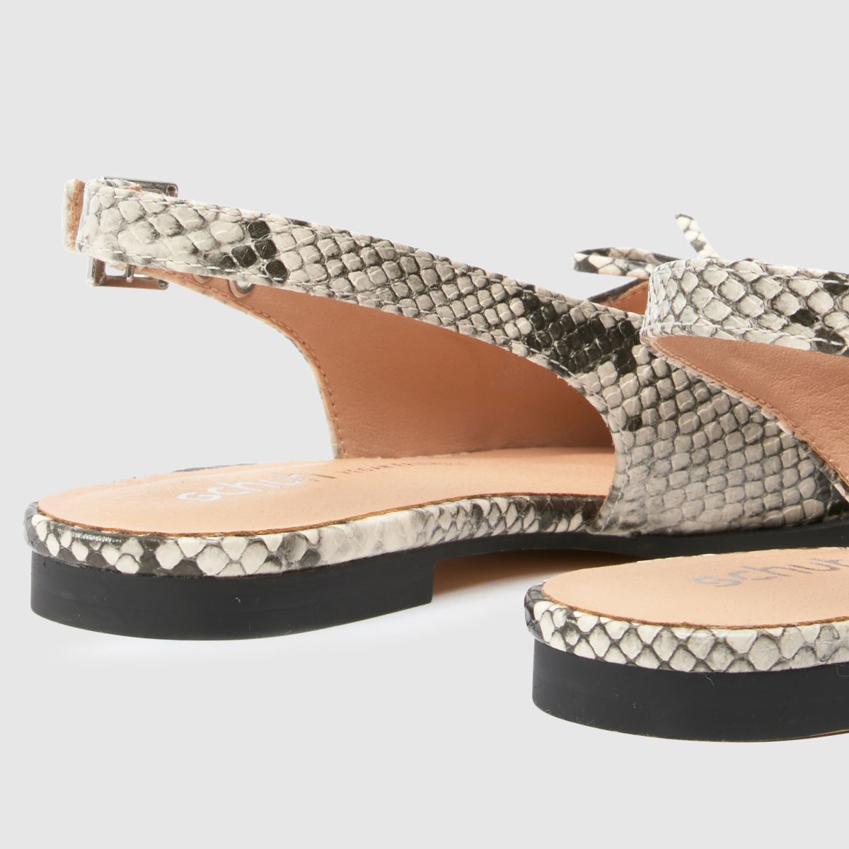 schuh  Lorie Point Hardware in White & Black schuh  Lorie Point Hardware in White & Black