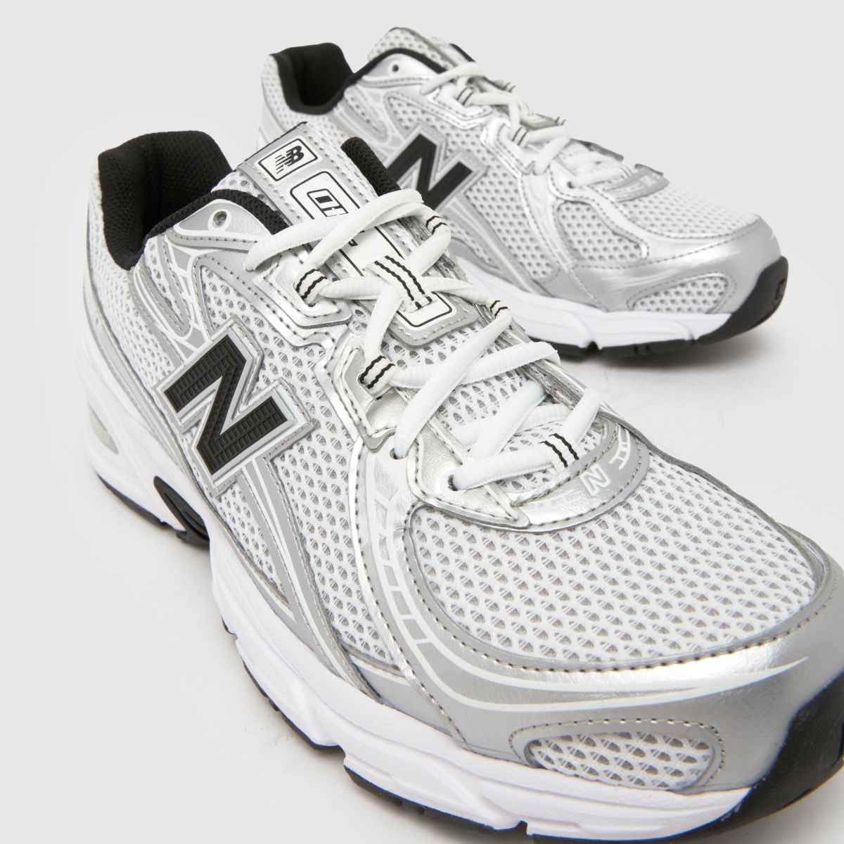 New Balance  740 in White & Silver New Balance  740 in White & Silver